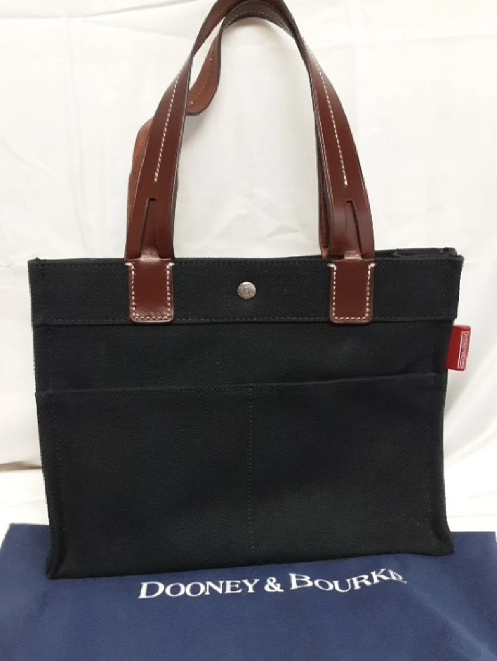 Dooney & Bourke Black Canvas Tote Style Handbag with Brown Leather Handles
